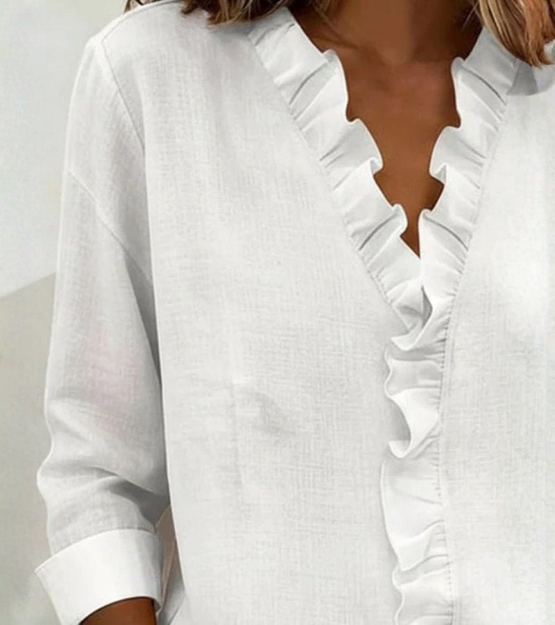 Aletta | Blusa con volant, scollo a v e maniche lunghe