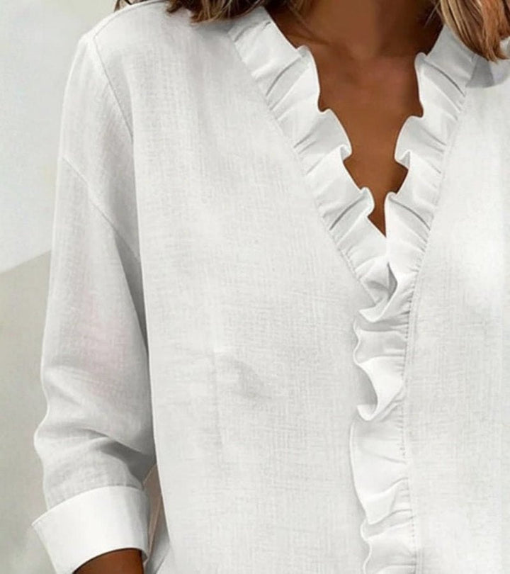 Aletta | Blusa con volant, scollo a v e maniche lunghe