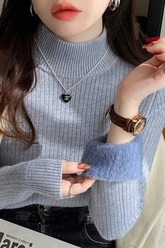 Em™ Maglione