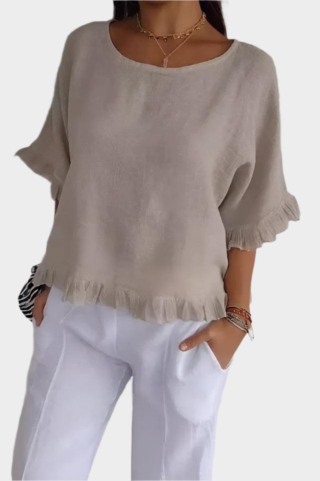 Top leggero in lino con volant e arricciature