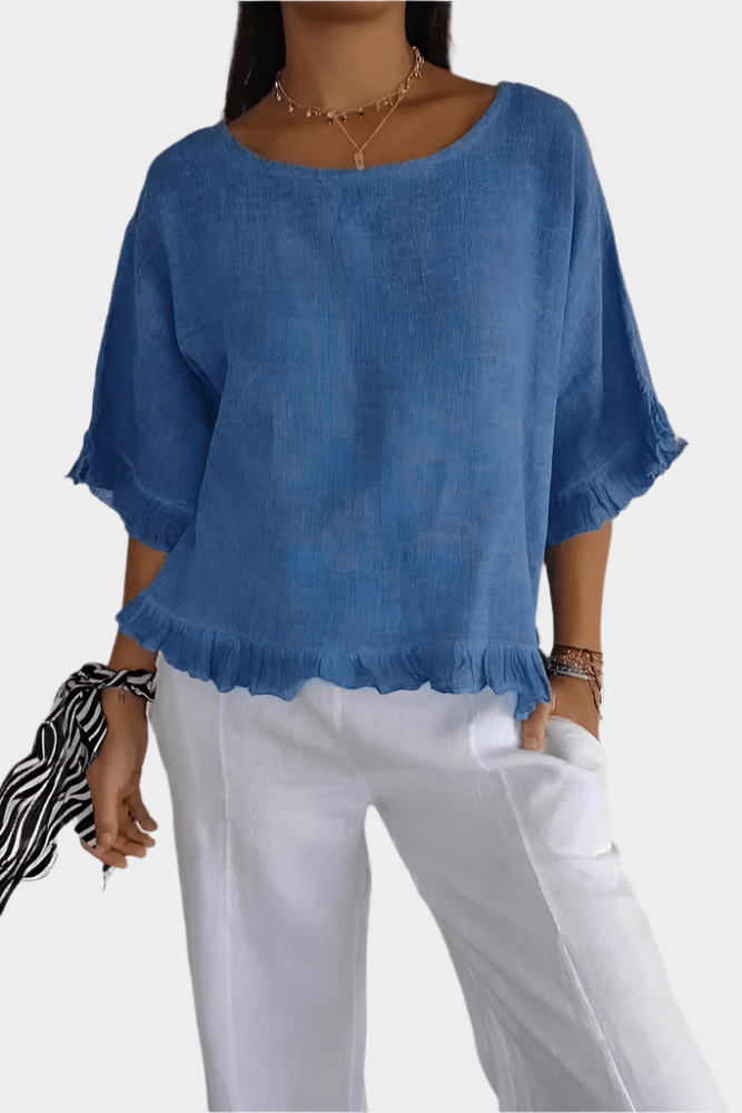 Top leggero in lino con volant e arricciature
