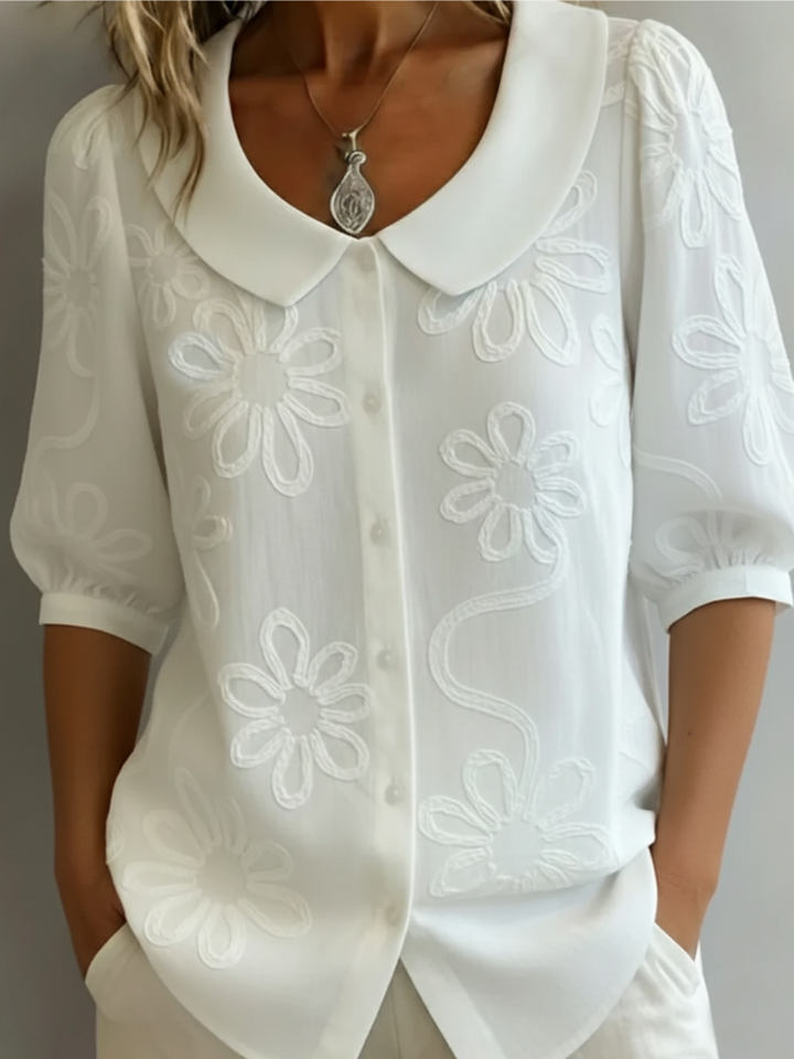 Sara | Blusa con fiori ricamati